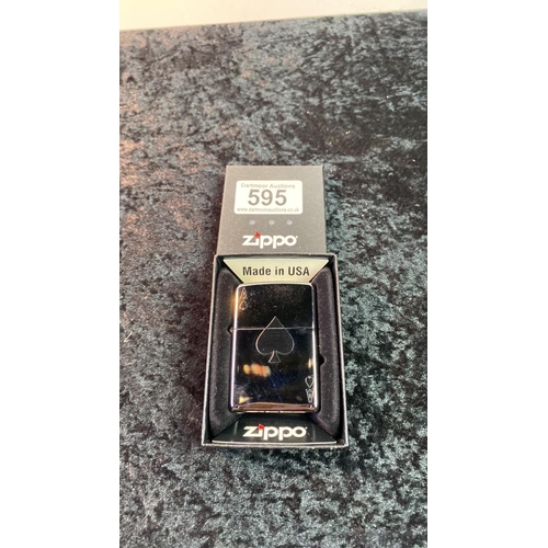 595 - A boxed Zippo lighter with an Ace Of Spades design