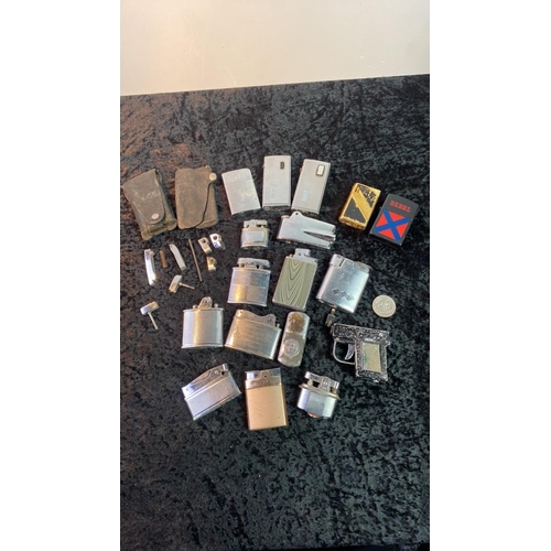 596 - A collection of vintage cigarette lighters and lighter parts including Ronson