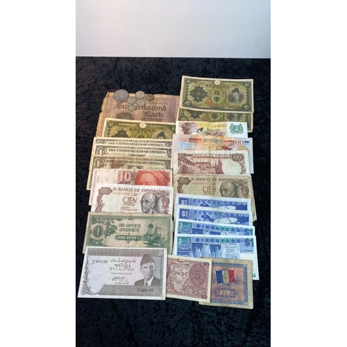 597 - A selection of vintage world bank notes and 2 silver coins