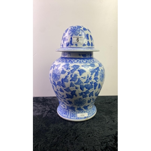 6 - Blue and white Chinese / Oriental style lidded urn, approx  33cm tall