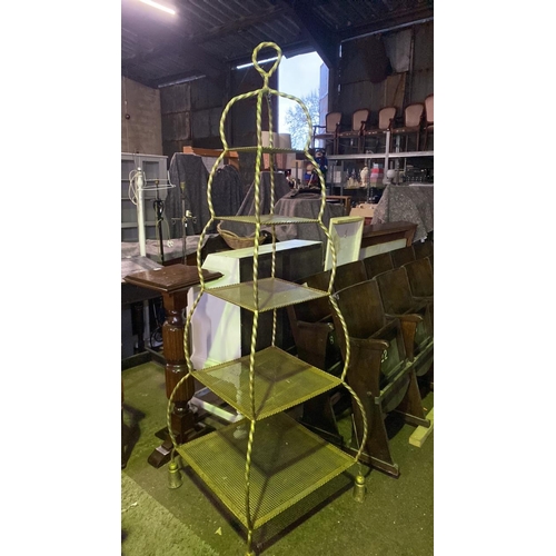 658 - Large brass tiered stand with five shelves. Approx 200cm tall and 62cm square at base. Would be perf... 