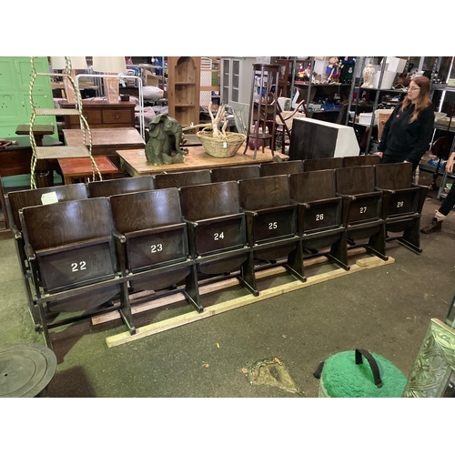 660 - Row of seven vintage wooden cinema seats - Measure approx 354cm across and 87cm tall. (attached in o... 