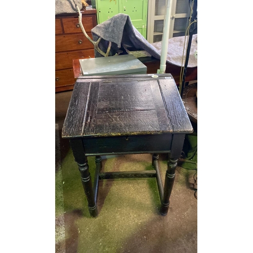 677 - A lovely antique wooden school desk with hinged lid and original inkwell. Lockable with key. Approx ... 