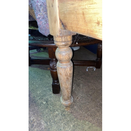 686 - A superb pine-topped kitchen table with solid construction and some age. Approx L182cm H73cm D84cm. ... 