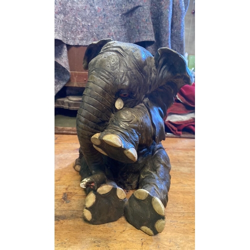 688 - Another lovely ellie, this time a smaller elephant statue. Approx H44cm to top of ears, and 25cm to ... 