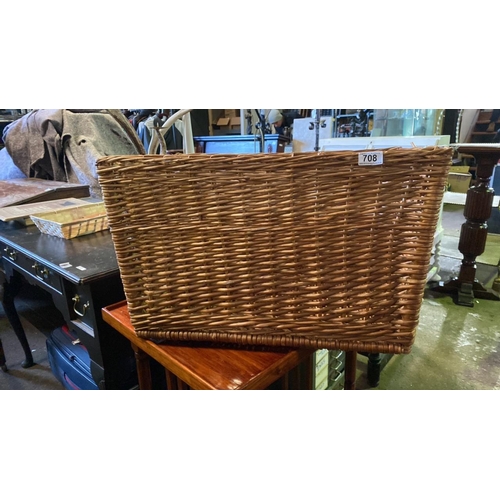 708 - A lovely solid woven wicker storage basket. Approx H40cm L66cm W40cm.