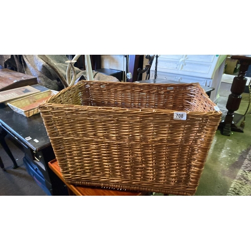 708 - A lovely solid woven wicker storage basket. Approx H40cm L66cm W40cm.