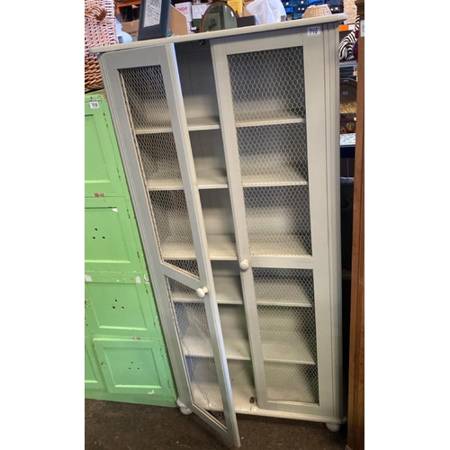 710 - A fabulous country kitchen storage unit with chicken mesh front and 6 internal shelves. One front ba... 