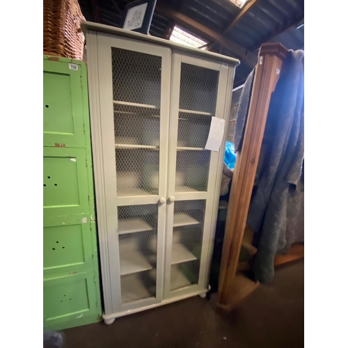 710 - A fabulous country kitchen storage unit with chicken mesh front and 6 internal shelves. One front ba... 