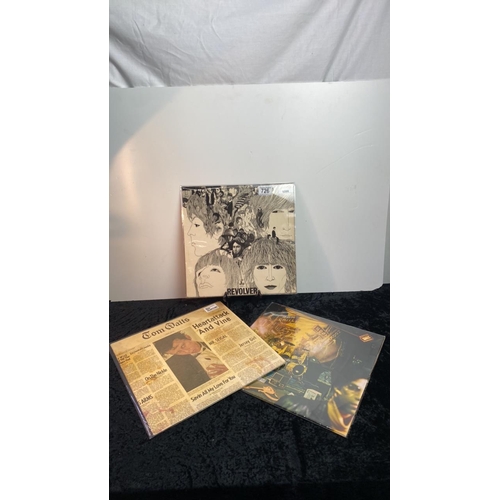 726 - A trio of albums, including Prince ‘Sign of the Times’ with 2 LPs inside, The Beatles ‘Revolver’, an... 