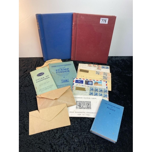 778 - Two Stamp albums with contents along with various envelopes containing loose stamps, a stamp finder ... 