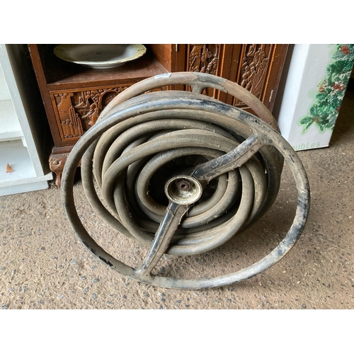 878 - Fabulous old hose reel on metal frame, wall hanging, from Bowdens industrial warehouse