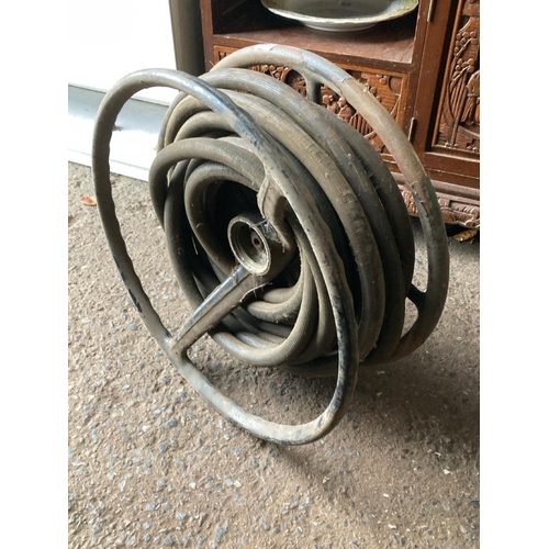 878 - Fabulous old hose reel on metal frame, wall hanging, from Bowdens industrial warehouse