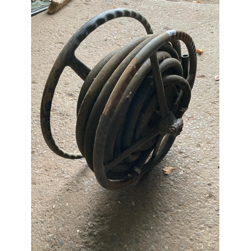 878 - Fabulous old hose reel on metal frame, wall hanging, from Bowdens industrial warehouse