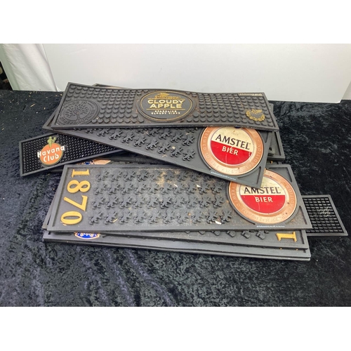 899 - A quantity of rubber bar beer mats including Amstel, Havana Club, and Strongbow