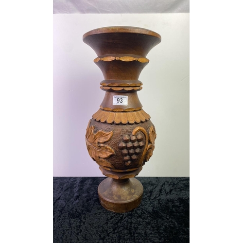 93 - Large carved wooden vase with grapevine design, approx 48cm tall