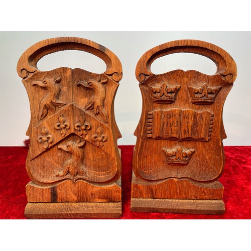 310a - Pair hand carved oak bookends with crests of Oxford University and Trinity College