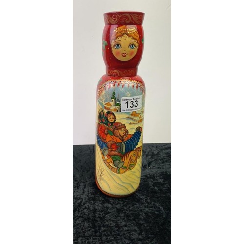 133 - A Russian doll style bottle holder with Christmas wintry design containing a bottle of Staraya Moskv... 