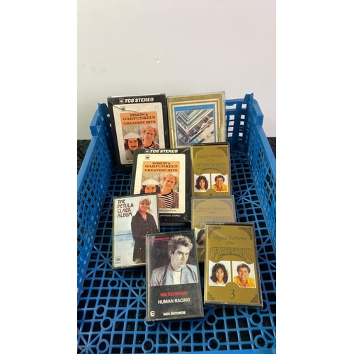 1035 - Beatles, Simon and Garfunkel 8 track tape cartridges along with cassette tapes.