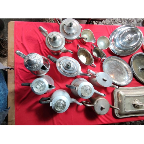 1105 - Large collection of silver plate and white metal tea sets, coffee pots plus fine silver service hote... 