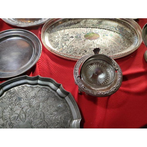 1106 - Collection of silver plate and white metal servers and platters, plus pretty silver plate globe butt... 