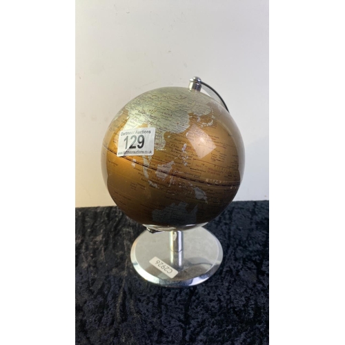 129 - Small globe on metal stand - approx 22cm tall - not to be purchased as a present for any member of T... 