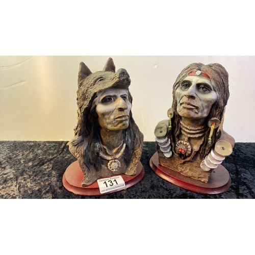 131 - 2 resin Native American figurines on wooden bases approx 18cm tall