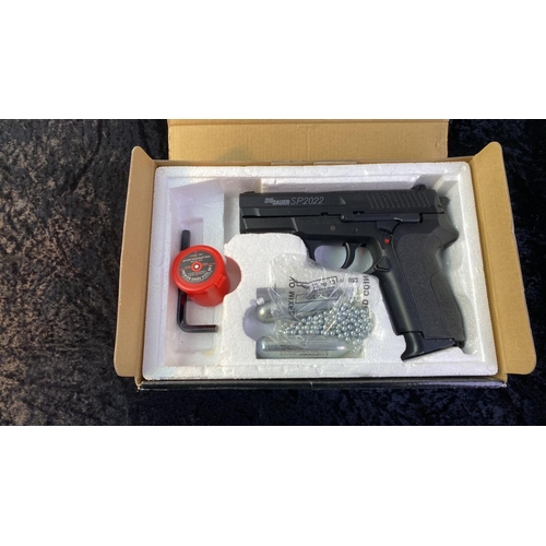 136 - Sig Sauer SP2022 CO2 Powered BB airgun, boxed with instructions and accessories