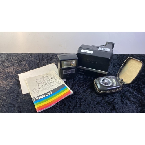 139 - Polaroid Sun 600 Land Camera, with instructions, flash and light meter