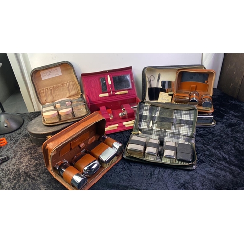 142 - Collection of vintage ladies and gents vanity cases / sets