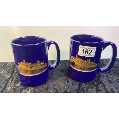 162 - A pair of Cunard QM2 mugs with gold ship design