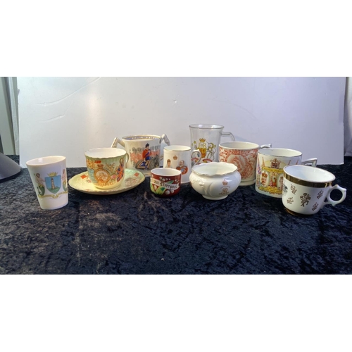 166 - A collection of Commemorative china and souvenir ware including a cup and saucer of The Coronation o... 