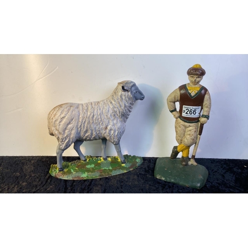 266 - Two cat iron door stops, one golfer and one sheep