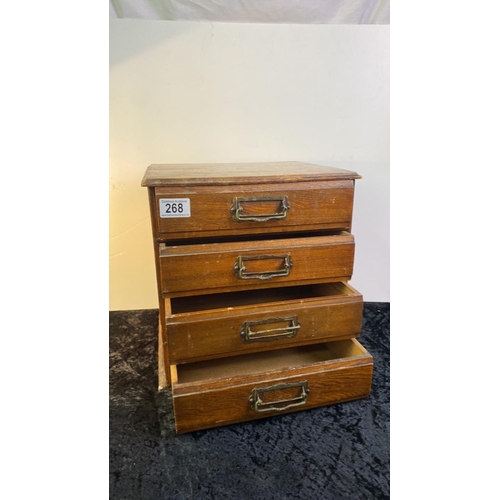 268 - Wooden  desktop chest with four drawers, measures approx 32cm x 32cm x 27cm, base a/f