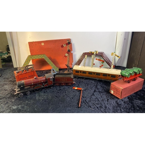 269 - Hornby railway accessories including signals and a dray carriage with barrels along with a larger ga... 