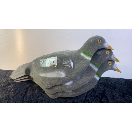 691 - A set of 3 pigeon decoys