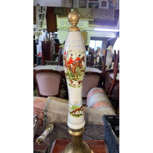 709 - Two hand beer pumps with hunting designs on handles