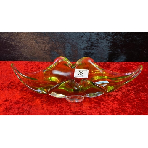 33 - Red and yellow Murano style glass vase approx 10 cm high and 30 cm wide