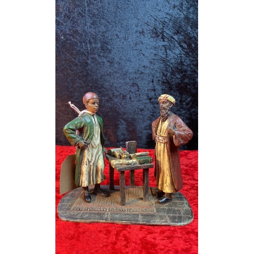 64 - Bronze sculpture of two men with a table of books. Signed B to base, possibly for Bergman. Approx 14... 