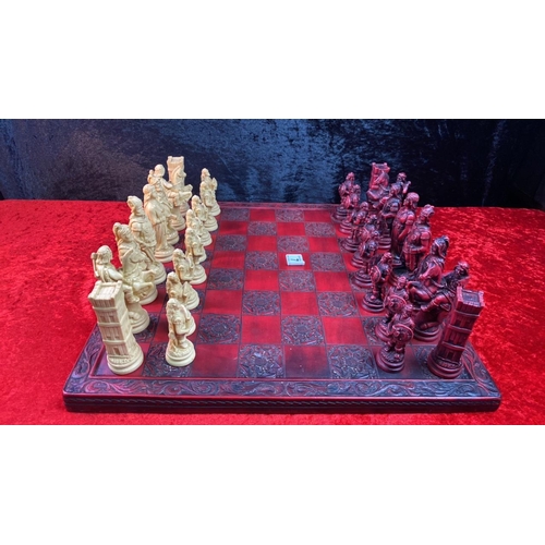 75 - Fabulous and very impressive resin chess set, board measures approx 46cm squared