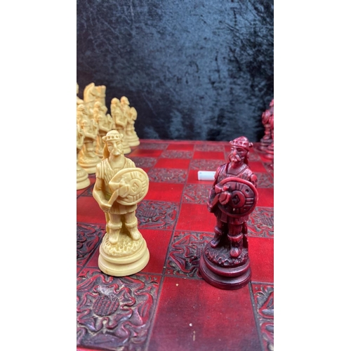 75 - Fabulous and very impressive resin chess set, board measures approx 46cm squared