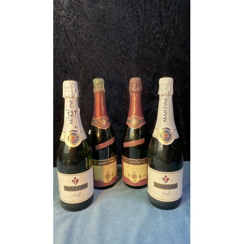 127 - Two bottles of Segua Viudas Brut Reserva Cava and two bottles of Martini Asti