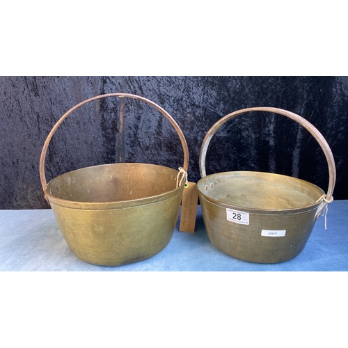 28 - Two large brass cooking pots / jam pans with handles