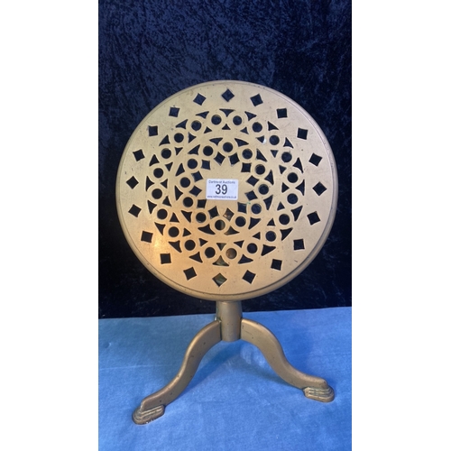 39 - Brass trivet with tilting top, approx 30cm tall (when top is flat)