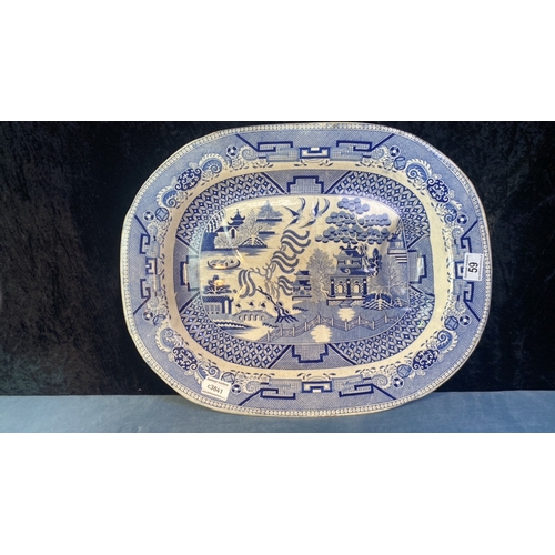 59 - Large blue and white willow pattern meat plate, approx 42cm x 53cm with moulded stand underneath, pl... 