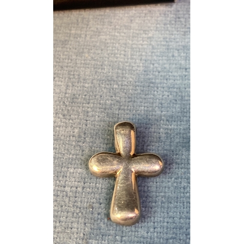 597 - Two lovely, unusual silver cross pendants and chain