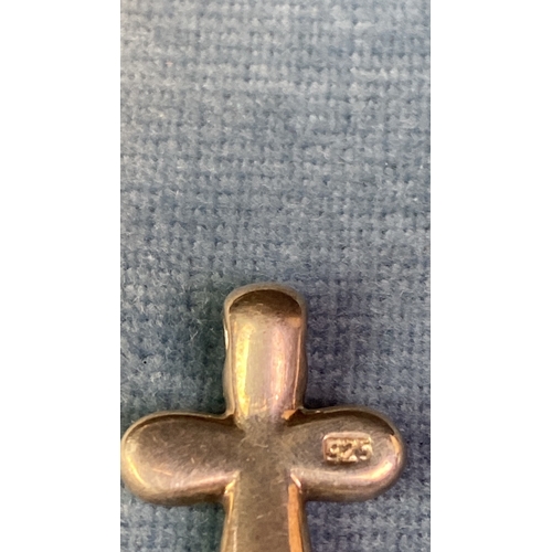 597 - Two lovely, unusual silver cross pendants and chain