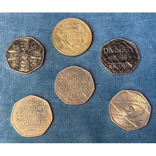 633 - Five collectible 50p coins and a £2 coin