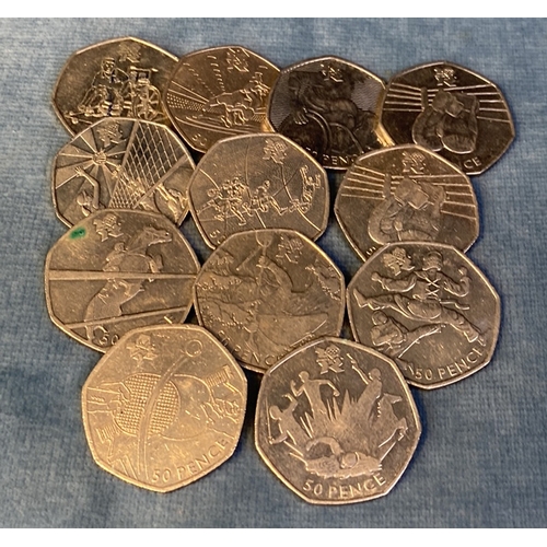 638 - 12 x collectible 50p coins, London 2016 Olympics. Includes boxing, basketball, boccia, canoeing, equ... 