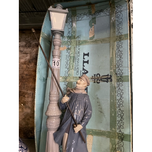 10 - Large Lladro lamplighter figure complete with long staff lighter and box (box is a/f), approx 46.5cm... 